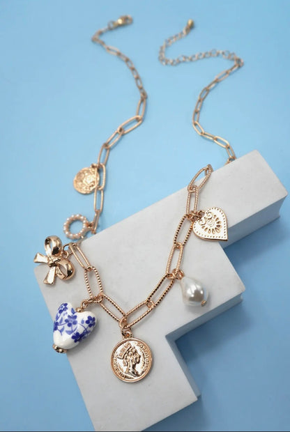 porcelain bow & heart charm necklace