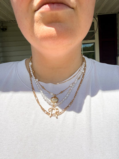 pearl bow layering necklaces