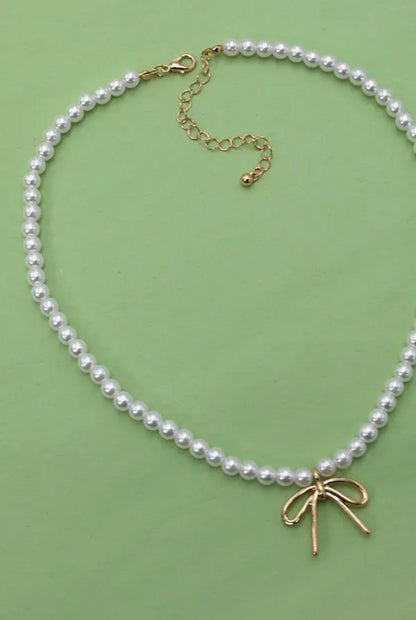 pearl chain bow charm necklace